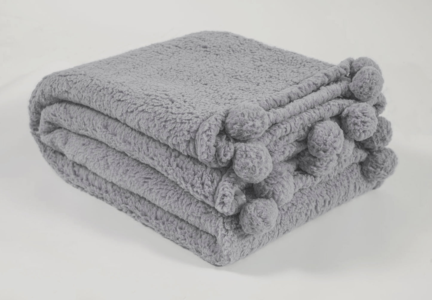 Soft Sherpa Pom Pom Throw in Silver Grey