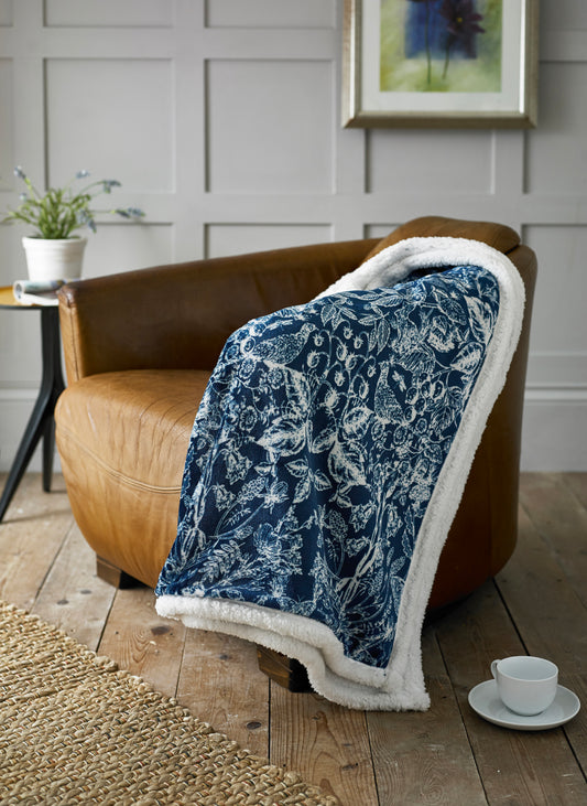 Supersoft Sherpa Reverse Secret Garden Animal Throw in Navy Blue