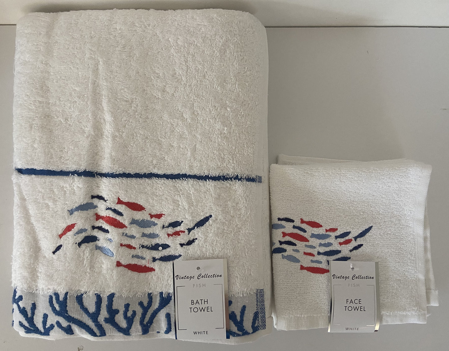 Fish Swarm Design Towel Range in White
